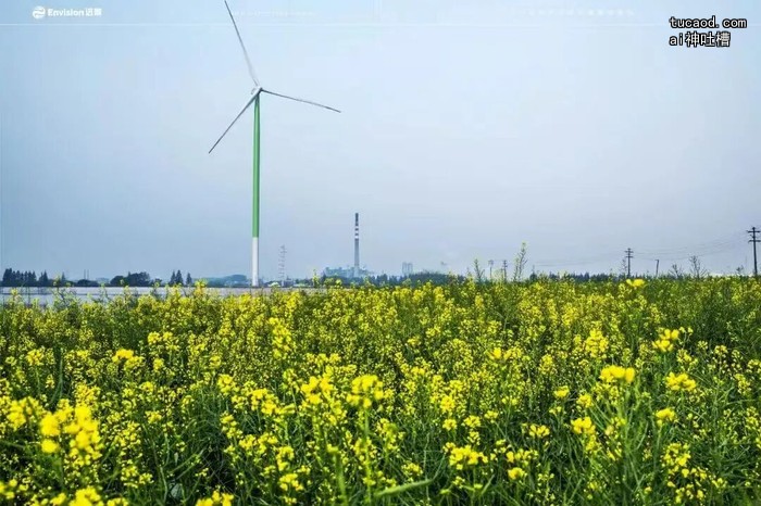 远景风机油菜花田绿白塔筒